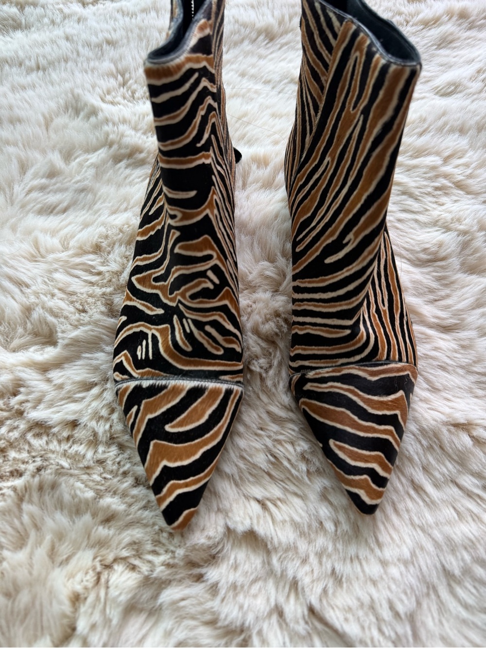 Alexandre Birman Zebra-Print Pointed Ankle Boots in Black and Brown